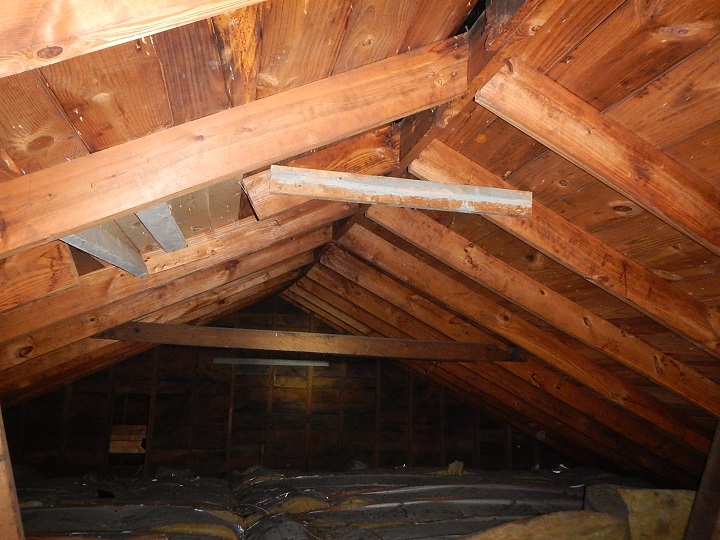 cut rafter found in an attic by a licensed home inspector while inspecting the roof system