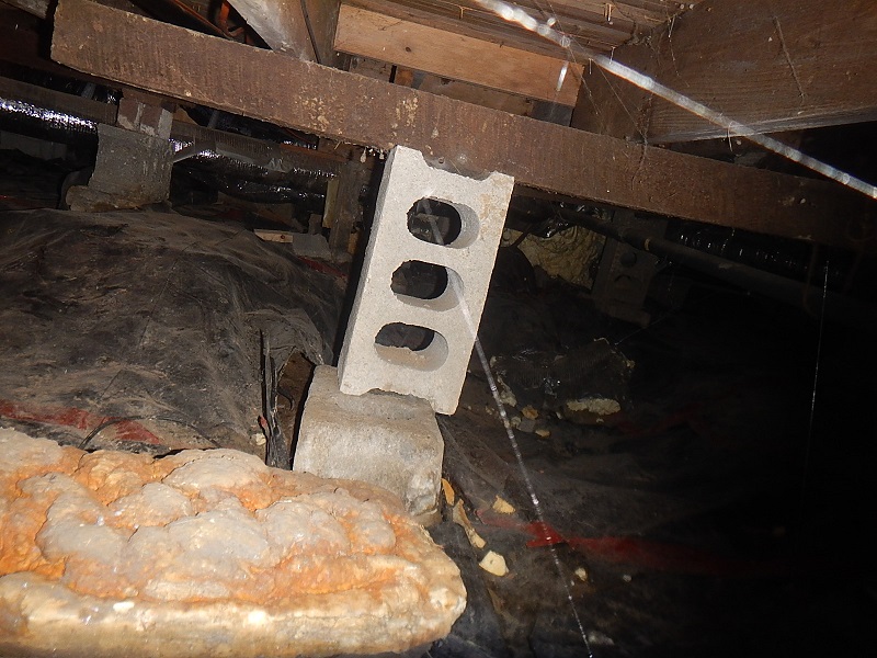 Improper blocking and supporting in the crawlspace found by the home inspector near newburgh indiana