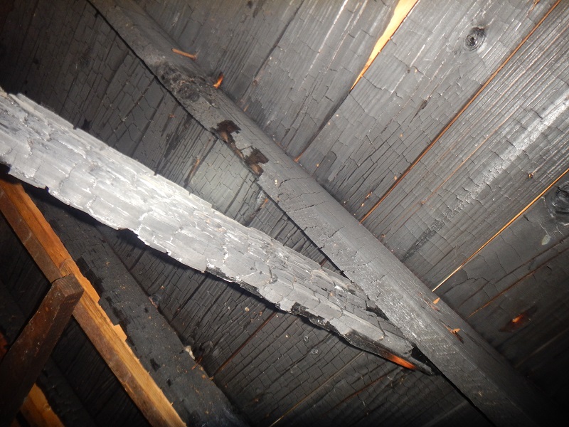 roof structure in the attic damaged by fire found by the home inspector near evansville indiana