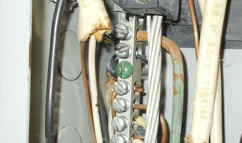 Neutral wire with melted insulation found by the home inspector near evansville indiana