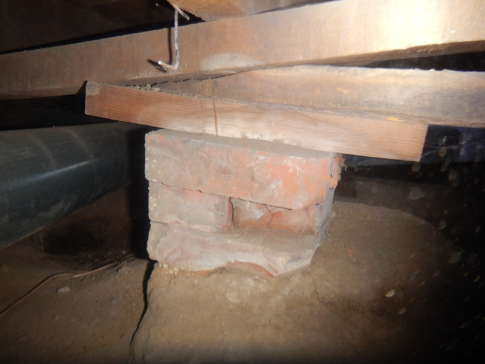 Incorrect and failing pier found by the home inspector in a crawlspace ne evansville indiana