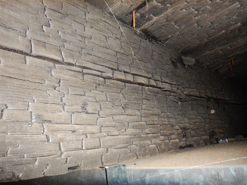 Serious fire damage in the crawlspace found by the home inspector near newburgh indiana