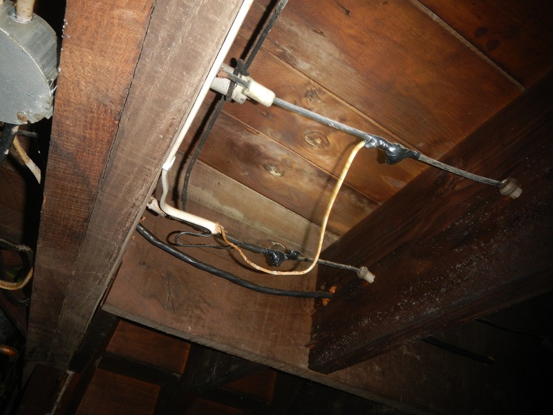 old knob and tube wiring in use and improperly spliced